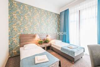 Отель Hotel Polonia Centrum Вроцлав Улучшенный двухместный номер с 2 отдельными кроватями-1